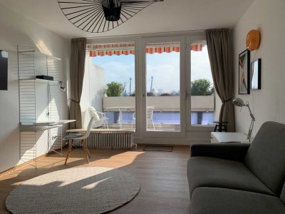 Perfekte Aussicht: Voll möblierte, helle & geräumige 1-Zimmer-Wohnung mit Südbalkon & EBK