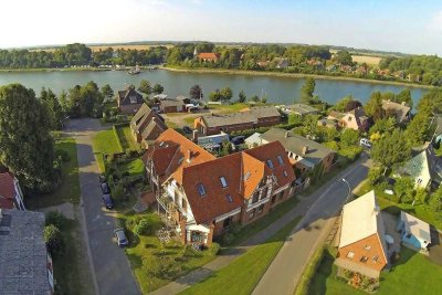großes Mehrgenerationenhaus direkt am NOK mit 8 Wohneinheiten auf 2000qm Grundstück