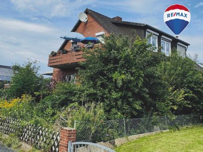 Haus mit vermieteter Einliegerwohnung