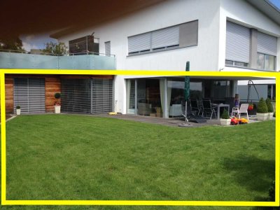 Einzigartige 3-Zimmer-Terrassenwohnung mit wunderschönem Garten