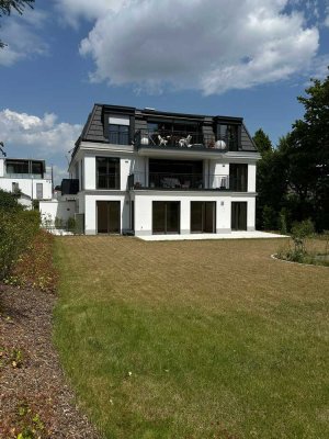 SECRET SALE! Harlaching, 4 Zi.mit Gartenwohnung (ca.400 m²), luxuriös, sonnig und ruhig!