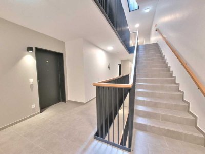 Modern und zentral wohnen - Hochwertige Neubauwohnung mit vollausgestatteter Einbauküche