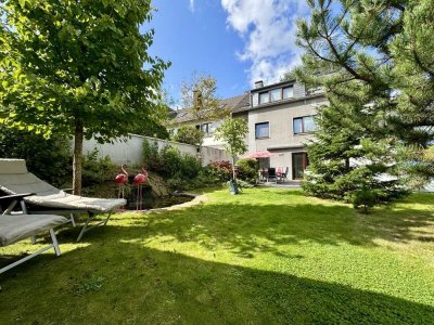 Stadtparkflair trifft Gartenparadies - EG Wohnung mit Garten und 4 Garagen