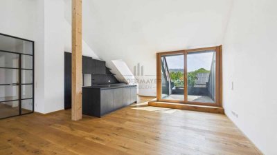 Design trifft Wohnen: 
hohe Decken, offene Küche, Gemeinschaftsgarten und zwei Terrassen