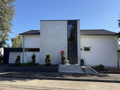 Einzigartiges Einfamilienhaus mit Waldblick und lichtdurchflutetem Ambiente