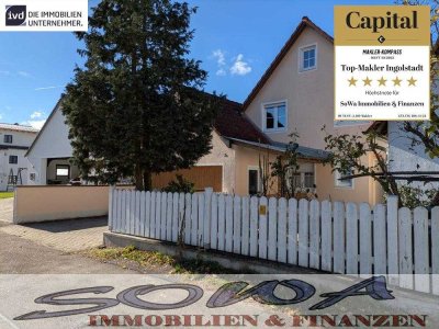 Zentrumsnahes Einfamilienhaus mit guter Raumaufteilung und einer großen Garage im Englischen Gart...