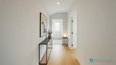 Neubau trifft Gemütlichkeit – Zuhause über den Dächern