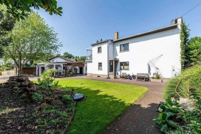 Einfamilienhaus auf schönem Grundstück in Altrhein-Nähe