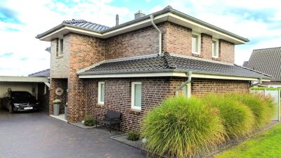 Eleganz und Wohnkomfort vereint: Moderne Stadtvilla in begehrter Lage von Brake-Golzwarden