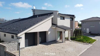 Hochwertig. Modern. Anders. – Exklusives Einfamilienhaus mit Pool!