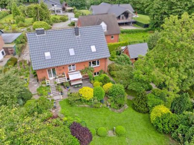 Modernisiertes Einfamilienhaus mit herrlichem Garten und Baulücke in begehrter Lage am Mühlenteich