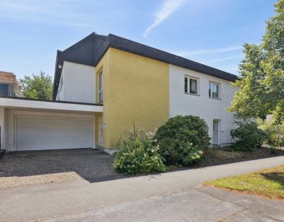 Modernes Wohnen trifft Vorstadtidylle –Einfamilienhaus mit Einliegerwohnung in bester Homburger Lage