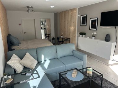 Möblierte 1-Zimmer- Terrassenwohnung, 46qm, Erstbezug mit Küche und Bad