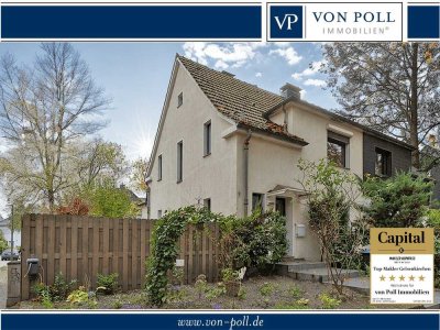 Charmantes Einfamilienhaus mit großem Garten und drei Garagen