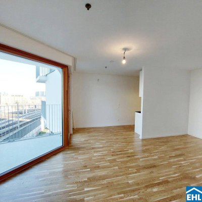 Sonnwendviertel: 1-Zimmer-Wohnung mit Balkon im 10. OG – Fitnessraum, Co-Working &amp; Rooftop-Terrasse inklusive!