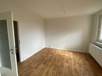 Familienfreundlich & modern: Sanierte Wohnung in bester Lageng ist bereit!