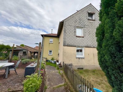 Renovierungsbedürftiges  Mehrfamilienhaus mit Garten