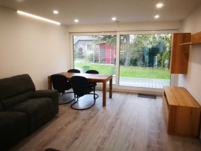Elegante, voll möblierte Gartenwohnung (ca. 75 m²) mit Terrasse & Privatgarten in Nußloch