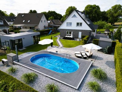 Modernes Einfamilienhaus mit Gästehaus, Pool & Traumgarten – Einziehen & Wohlfühlen!