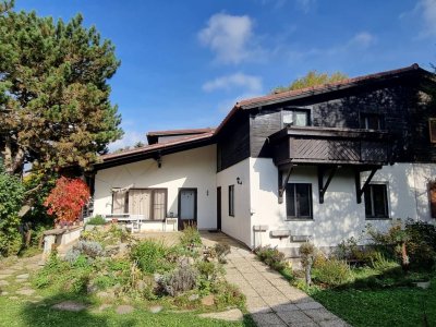 GERÄUMIGES EIN / ZWEIFAMILIENHAUS IN SONNIGER LAGE