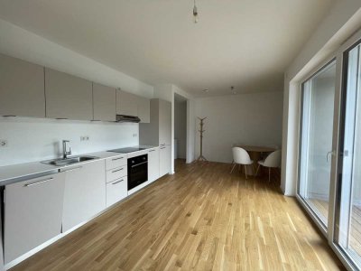 Erstbezug: Teilmöblierte 1-ZKB-Wohnung mit Balkon
