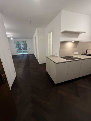 Exklusive 2- Zimmer Neubauwohnung im EG mit Garten in München - Solln