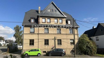 Mehrfamilienhaus mit großem Garten und Stellplätzen