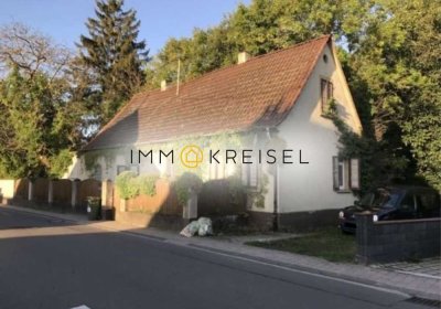 Niedrige Provision: Charmantes Grundstück mit Bachlauf – Abrissobjekt für neue Projekte!