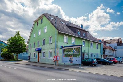 Investieren mit Perspektive: Vollvermietetes Mehrfamilienhaus mit Gewerbeeinheit - Rendite: 7,35%