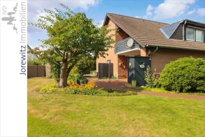 Zentrumsnah in Brackwede: Zweifamilienhaus mit Doppelgarage und großem Gartengrundstück