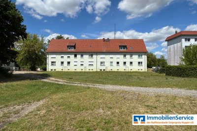 Geflegte 4-Zi.-Erdgeschosswohnung mit Gartenblick, zwei Kellerräumen und Garagenoption!