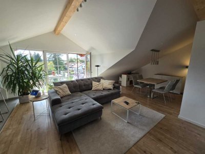 Moderne Dachgeschosswohnung mit hochwertiger Ausstattung in grüner Lage