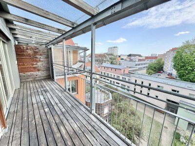 Geräumige Dachgeschosswohnung mit überdachten Süd-Balkonen in zentraler Lage