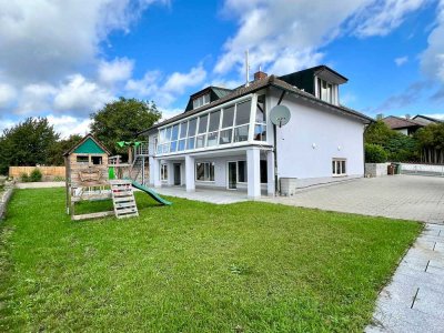 Großzügige 4-Zimmer Wohnung mit 25m2 Wintergarten & großen Garten