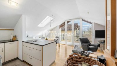 Attraktive Eigentumswohnung im Dachgeschoss eines modernen Mehrfamilienhauses