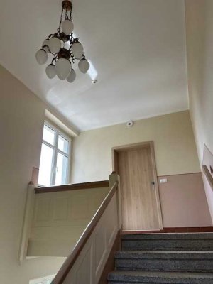 Erstbezug nach Sanierung mit Balkon: Freundliche 3-Raum-Loft-Wohnung mit geh. Innenausstattung