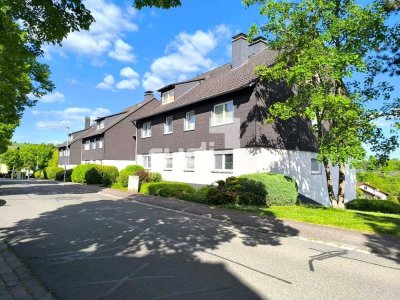 Grünes Wohnidyll mit Weitblick – Charmante EG-Wohnung mit Loggia und Süd-West-Lage zur Hofseite!