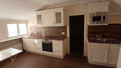 Schöne 1,5-Zimmer-Wohnung im Grünen mit  Wohnküche, befristet bis 30.11.2027