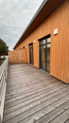 Wunderschöne helle drei Zimmer Neubau Terrassenwohnung