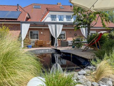 Gemütliches Einfamilienhaus mit Ferienwohnungen in Werdum, 270 m² Wohnfläche, traumhafte Südterrasse