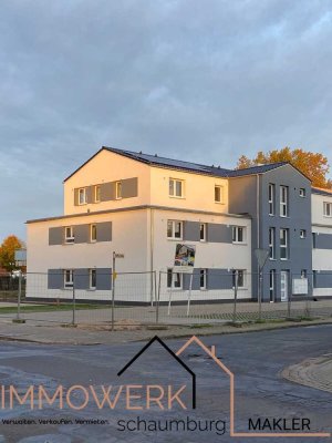 Traumhafte Neubau-DG-Wohnung mit Dachterrasse und Stellplatz zu vermieten.