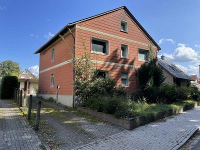 3-Parteienhaus in Rulle mit viel Entwicklungspotenzial und großem Grundstück!