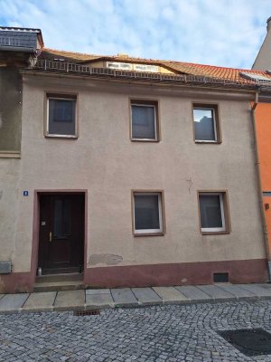Reihenmittelhaus mit grünem Hinterhof