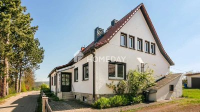 Charmante Doppelhaushälfte mit Nebengebäude und Garage in Dienstedt