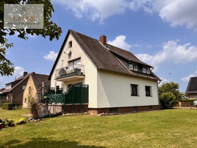 Neustadt-Mandelsloh: Vermietetes Zweifamilienhaus in begehrter Lage zu verkaufen.