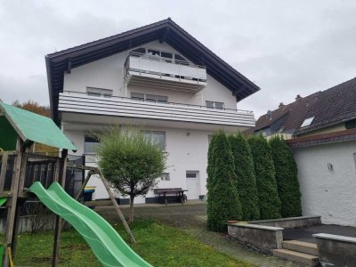 Exklusives Einfamilienhaus mit Einliegerwohnung, moderner Technik & großem Garten.