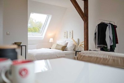 Charme trifft Moderne in einer neuen Wohnung im Erstbezug