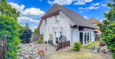 In familienfreundlicher Wohnsiedlung mit liebevoll gestaltetem Garten