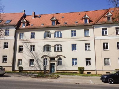 Investieren in Marienthal: Vermietete Wohnung mit Balkon, Tageslichtküche & Stellplatz