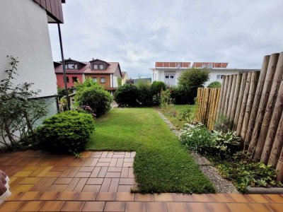 Sonnige große Wohnung mit Garten und Garage